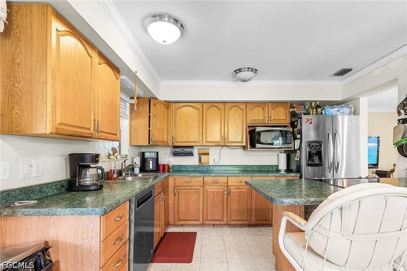 3 bedroom SingleFamilyResidence at 6351 Allen Park Dr, Kreamers Avocado Subd, Bokeelia — photo 4