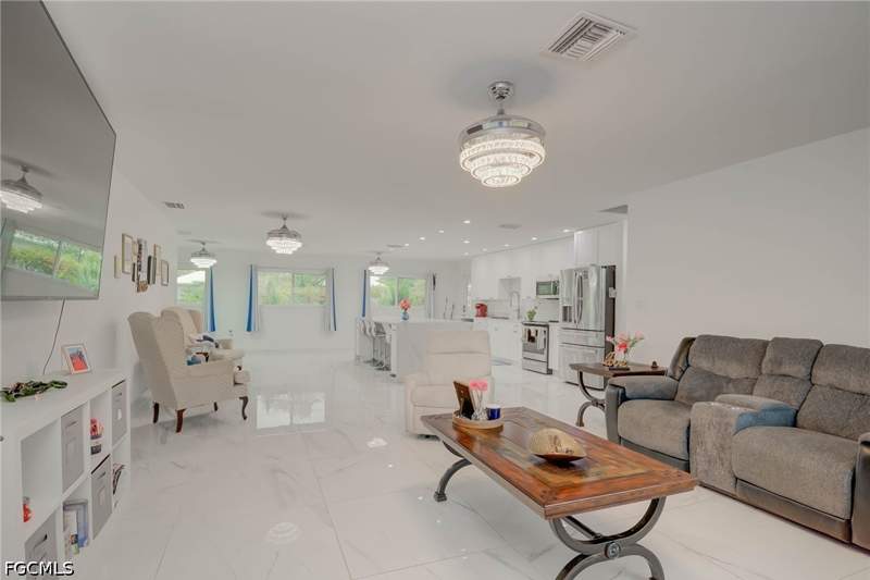 4 bedroom SingleFamilyResidence at 14539 Riverside Dr, Paradise Shores, Fort Myers — photo 2