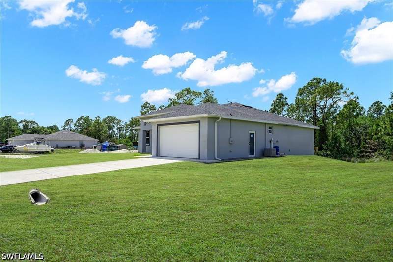 4 bedroom SingleFamilyResidence at 1905 Charles Ave N, Lehigh Acres, Lehigh Acres — photo 2