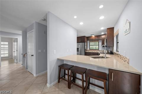 1410 Sand Castle Rd, Sanibel FL - photo 7 of 38