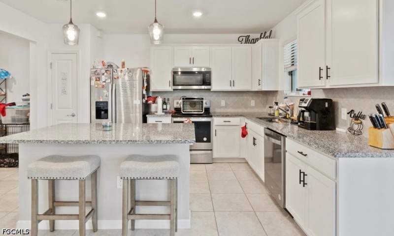 4 bedroom SingleFamilyResidence at 10804 Firebush Cir, Enclaves At Eagle Landing, North Fort Myers — photo 5