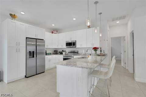 28 NW 26th St, Cape Coral FL - photo 7 of 25