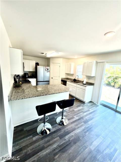 341 NE 13th Ter, Cape Coral FL - photo 7 of 32