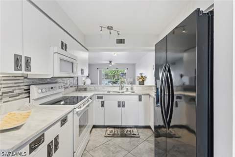 162 Pebble Shores Dr 101, Naples FL - photo 10 of 32