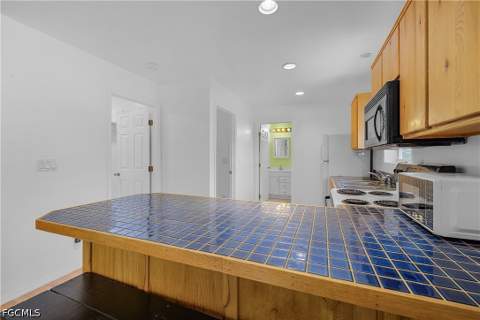 7322 Hibiscus Ave, Bokeelia FL - photo 6 of 26