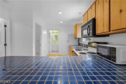 7322 Hibiscus Ave, Bokeelia FL - photo 7 of 26