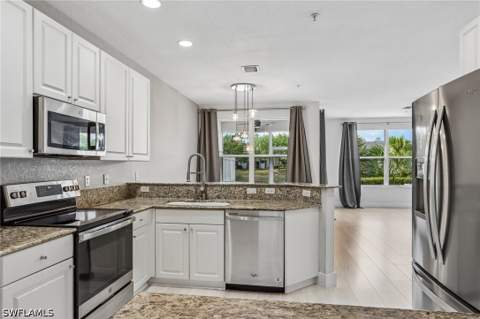 1410 Mariposa Cir 102, Naples FL - photo 7 of 50