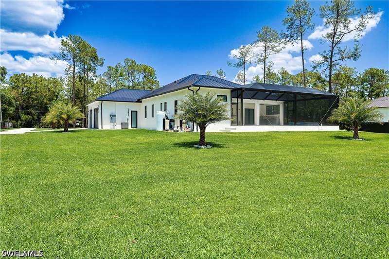 4 bedroom SingleFamilyResidence at 3430 1st Ave NW, Golden Gate Estates, Naples — photo 3