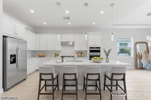 8957 Mustique Ln, Naples FL - photo 10 of 50