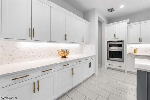 14212 Laguna Springs Ln, Naples FL - photo 16 of 47