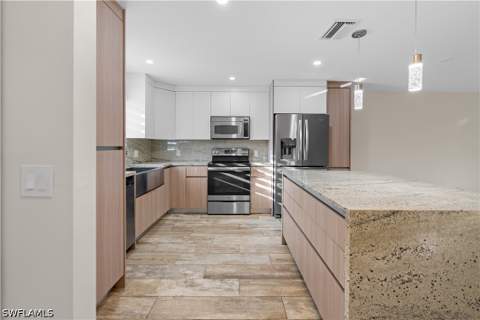 900 Henderson Creek Dr A102, Naples FL - photo 8 of 30