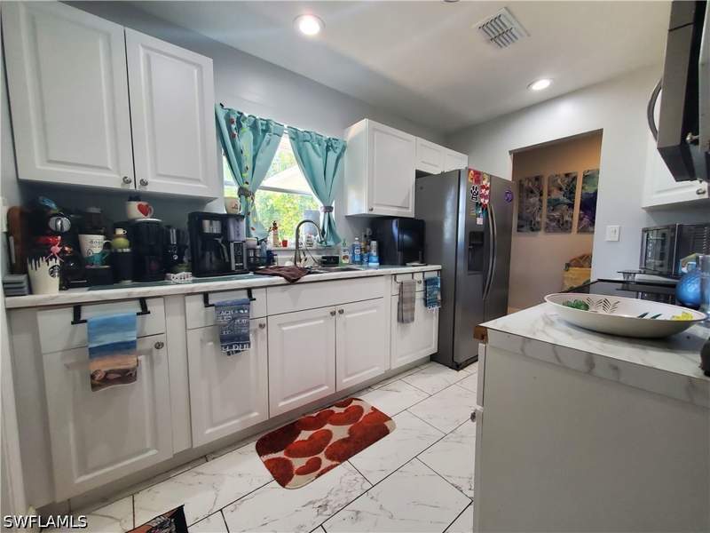 2 bedroom SingleFamilyResidence at 306 Hollywood St, Country Club, Lehigh Acres — photo 4
