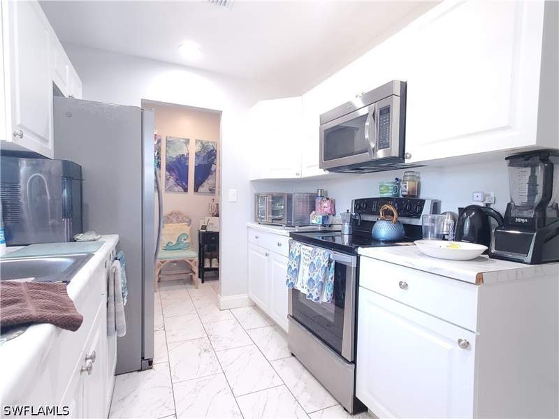2 bedroom SingleFamilyResidence at 306 Hollywood St, Country Club, Lehigh Acres — photo 5