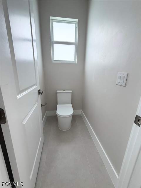 1013 Lincoln Ave, Lehigh Acres FL - photo 7 of 30