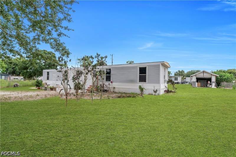 3 bedroom ManufacturedHome at 8106 Penny Dr, Suncoast Estates Unrec, North Fort Myers — photo 4