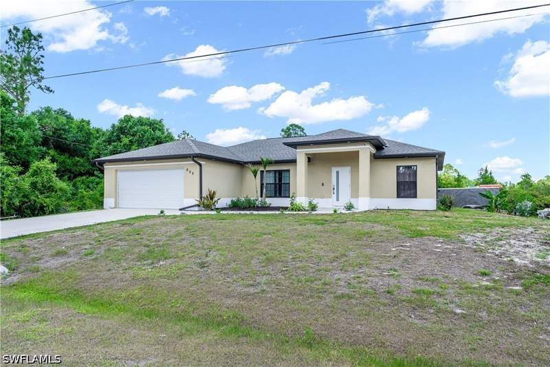 3 bedroom SingleFamilyResidence at 605 E 11th ST, LEHIGH ACRES, Lehigh Acres — photo 1