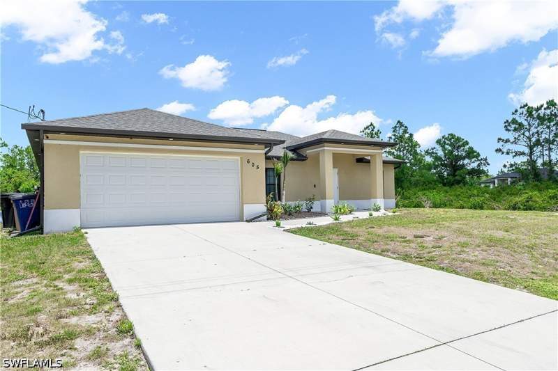 3 bedroom SingleFamilyResidence at 605 E 11th ST, LEHIGH ACRES, Lehigh Acres — photo 2