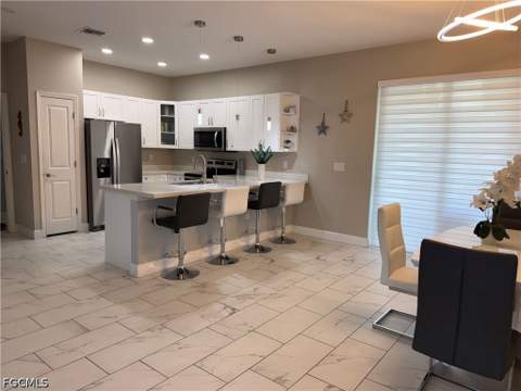 209 Nelson Rd N, Cape Coral FL - photo 7 of 32
