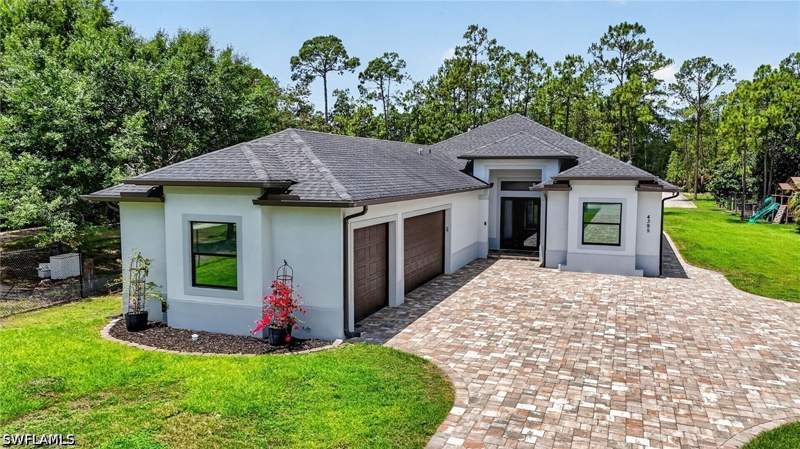 4 bedroom SingleFamilyResidence at 4395 16th St NE, Golden Gate Estates, Naples — photo 2