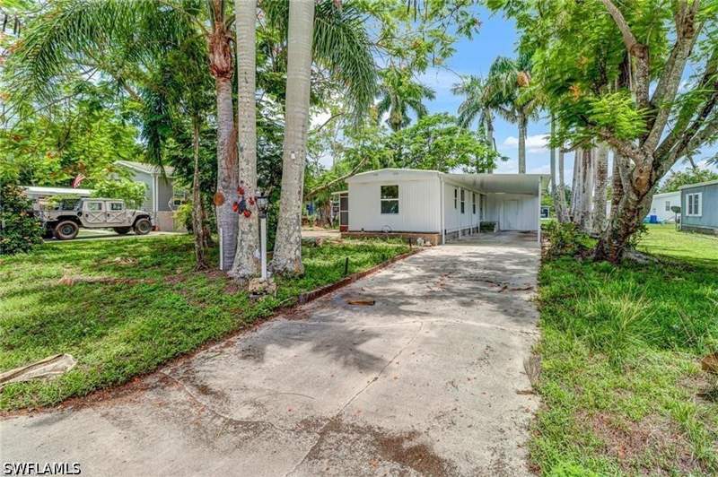 2 bedroom ManufacturedHome at 120 Grassy Key Ln 38, West Wind Estates, Naples — photo 2