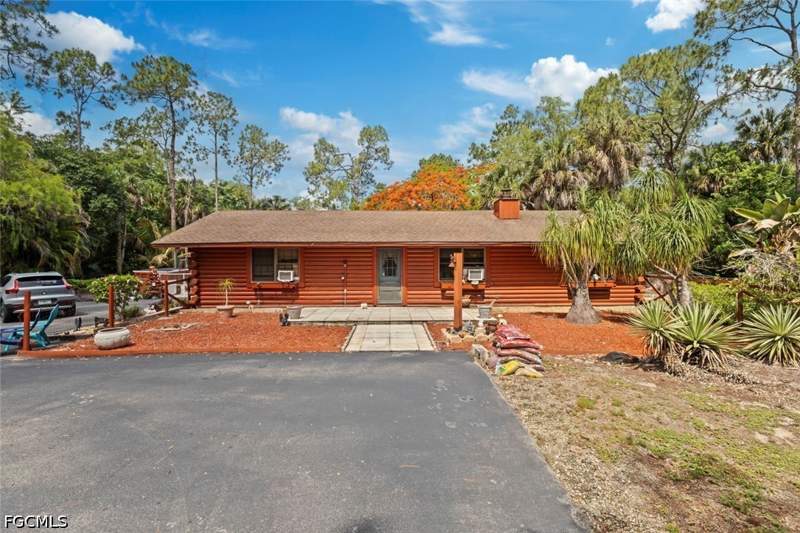 4 bedroom SingleFamilyResidence at 1445 31st St SW, Golden Gate Estates, Naples — photo 2