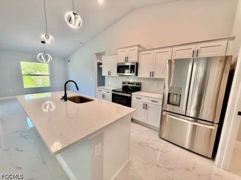 1017 Maple Ave N, Lehigh Acres FL - photo 7 of 34