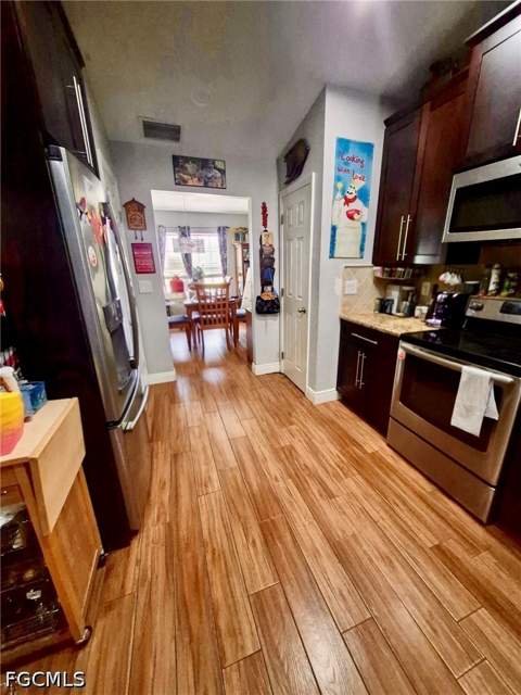 4009 NW 36th Ln, Cape Coral FL - photo 9 of 35