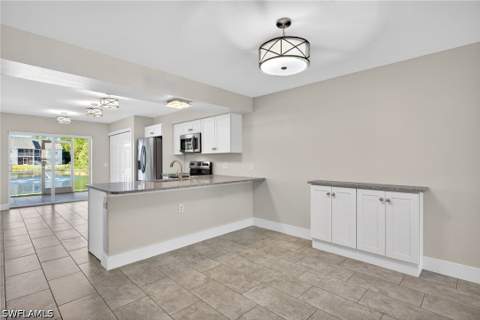 4910 Cougar Ct N 1-103, Naples FL - photo 12 of 37