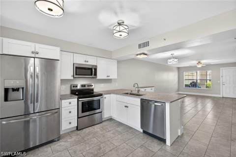 4910 Cougar Ct N 1-103, Naples FL - photo 14 of 37