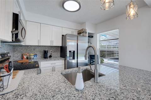 1307 SW 43rd Ln, Cape Coral FL - photo 6 of 25