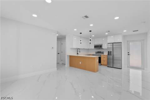 940 Berg St E, Lehigh Acres FL - photo 11 of 30
