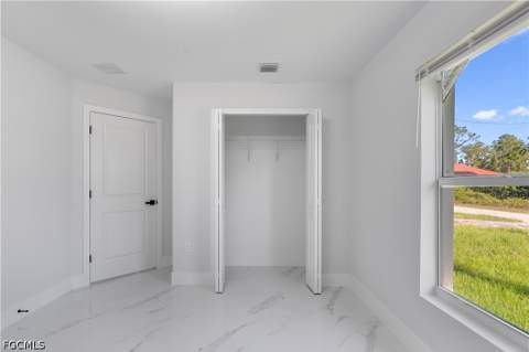 940 Berg St E, Lehigh Acres FL - photo 6 of 30