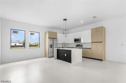 1306 NE 3rd Ave, Cape Coral FL - photo 7 of 28