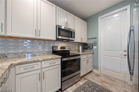 15840 Portofino Springs Blvd 101, Fort Myers FL - photo 11 of 33