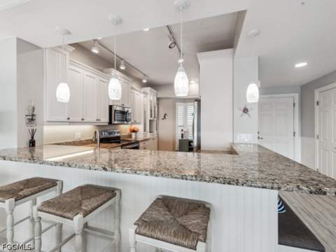 232 La Peninsula Blvd 232, Naples FL - photo 11 of 44