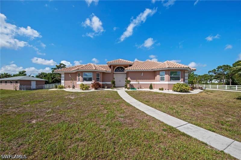 4 bedroom SingleFamilyResidence at 13541 Stringfellow Rd, Kreamers Avocado Subd, Bokeelia — photo 3