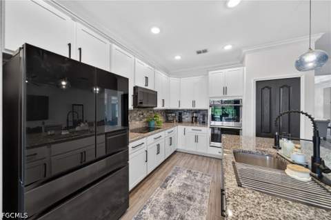 1321 NW 42nd Ave, Cape Coral FL - photo 10 of 38