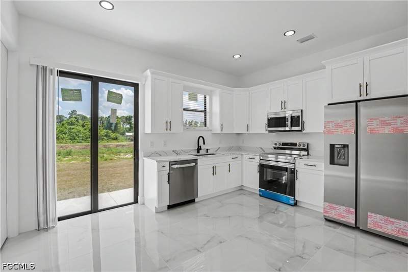 3 bedroom SingleFamilyResidence at 2803 1st ST W, LEHIGH ACRES, Lehigh Acres — photo 4