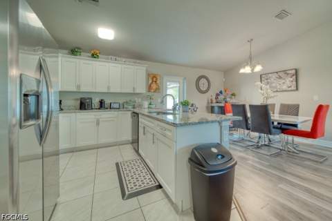 520 Wilmington Pkwy, Cape Coral FL - photo 7 of 47