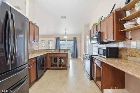 4129 NE 14th Pl, Cape Coral FL - photo 10 of 25