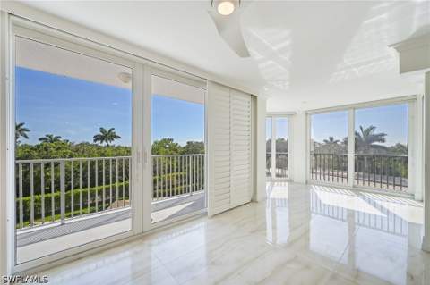 6361 Pelican Bay Blvd 202, Naples FL - photo 7 of 24
