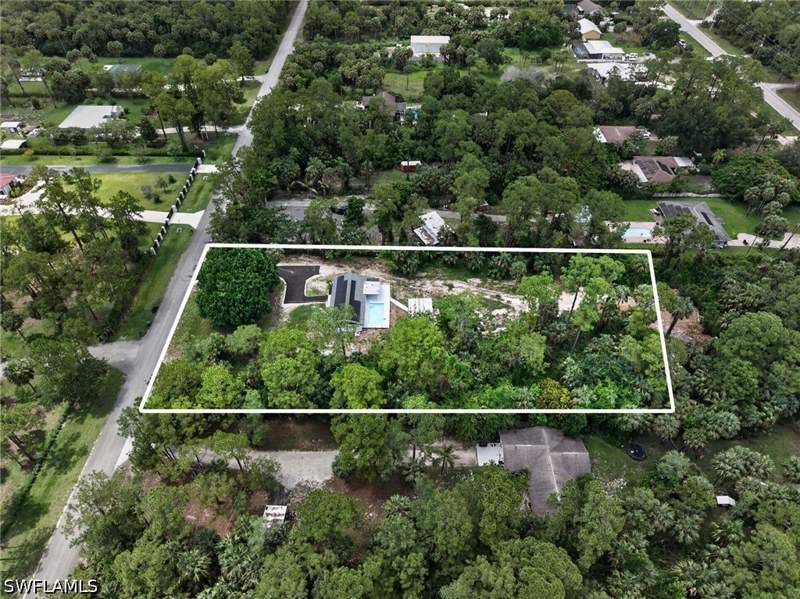 4 bedroom SingleFamilyResidence at 280 1st St NW, Golden Gate Estates, Naples — photo 4