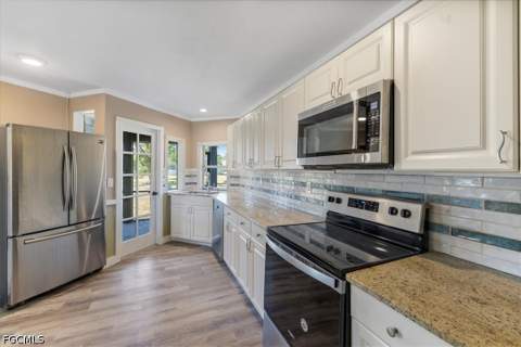 4216 SE 1st Ct, Cape Coral FL - photo 15 of 35