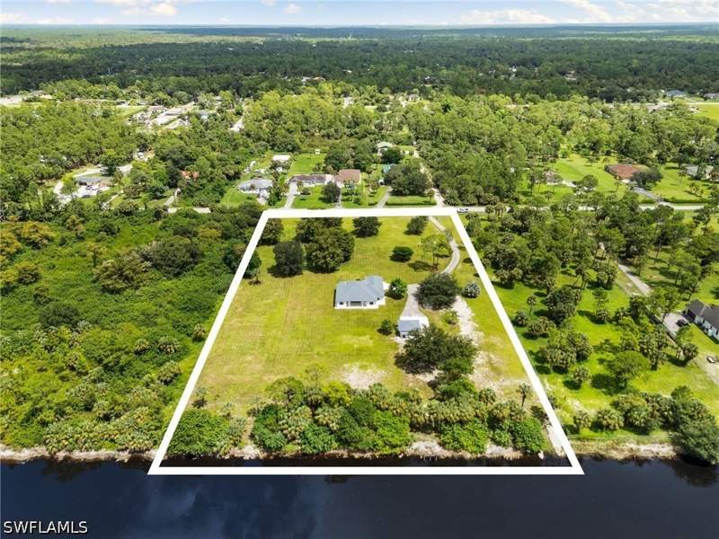 3 bedroom SingleFamilyResidence at 221 10th St SE, Golden Gate Estates, Naples — photo 2