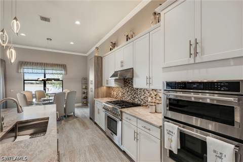 7478 Winding Cypress Dr, Naples FL - photo 11 of 50