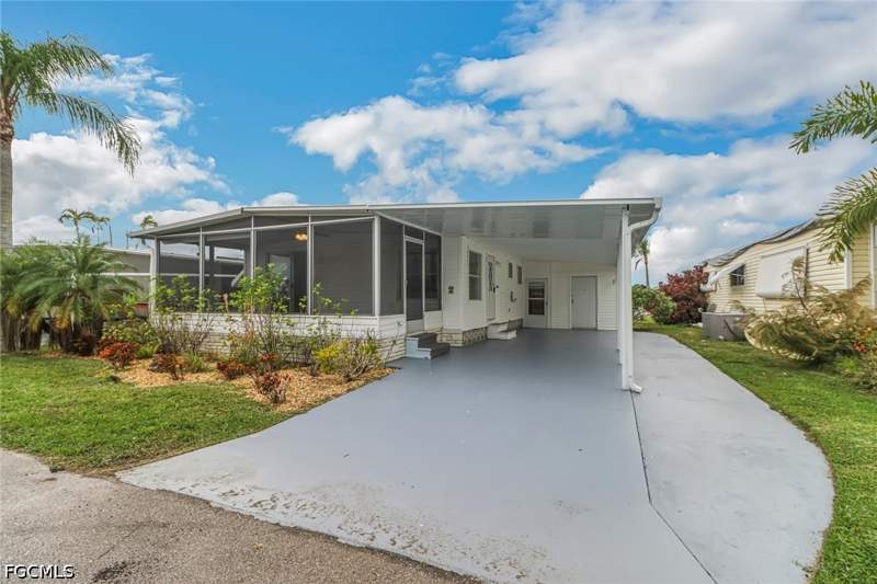 2 bedroom ManufacturedHome at 243 Tangerine Dr, Orange Harbor Mobile Home Park, Fort Myers — photo 4