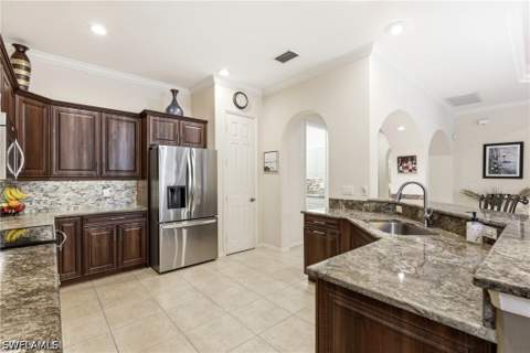 10736 Fieldfair Dr, Naples FL - photo 10 of 36