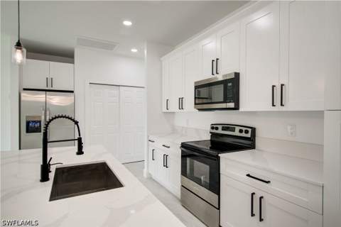 1020 Carroll St E, Lehigh Acres FL - photo 8 of 31