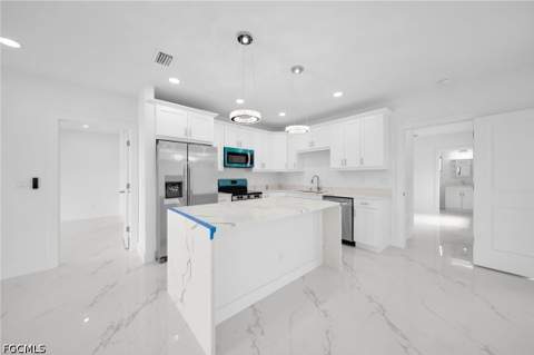 3721 NE 11th Pl, Cape Coral FL - photo 9 of 41