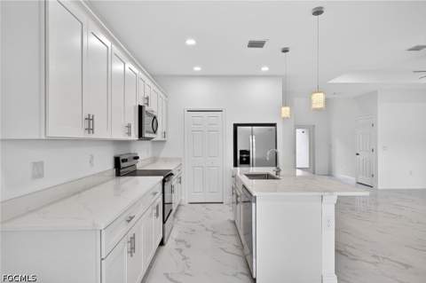 810 Jackson Ave, Lehigh Acres FL - photo 13 of 34